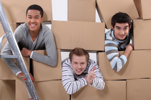 Moving professionals collaborating on a customized Ealing move